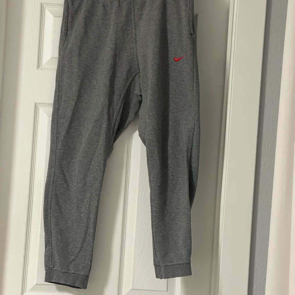 Nike Mens Team Club Charcoal Gray Joggers with Red Logo
